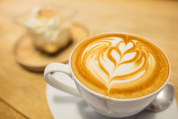 istock Coffee latte art on wood table 622429292