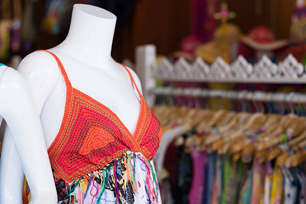 istock Mannequin in multicolored beach dress. 622429338