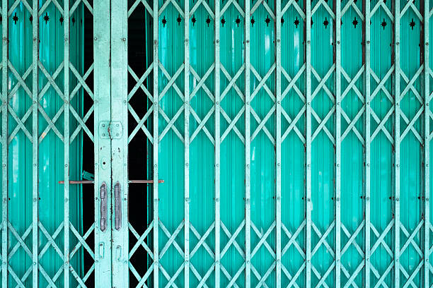 istock Folding old metal door gate. 622429460