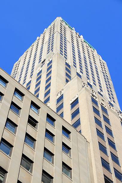 Manhattan Trump Building New York, USA - July 4, 2013: Trump Building skyscraper in New York. The 283m tall building was the tallest building in the world for a few weeks. nassau street stock pictures, royalty-free photos & images