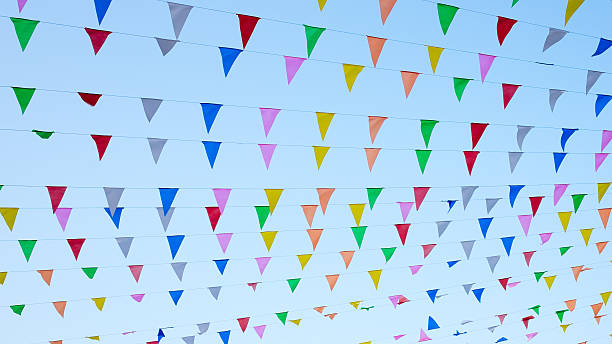 istock Colorful decoration flags on blue sky background. 622429878