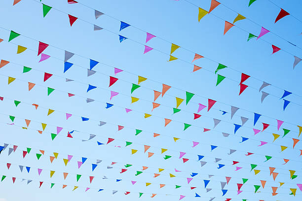 istock Colorful decoration flags on blue sky background. 622429930