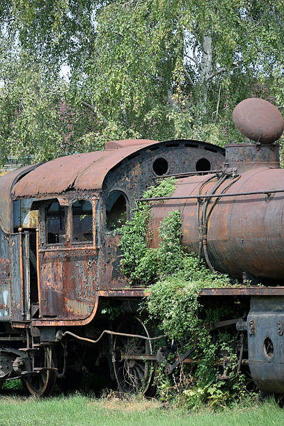 istock Abandoned old locomotive on the railroad siding 622430068