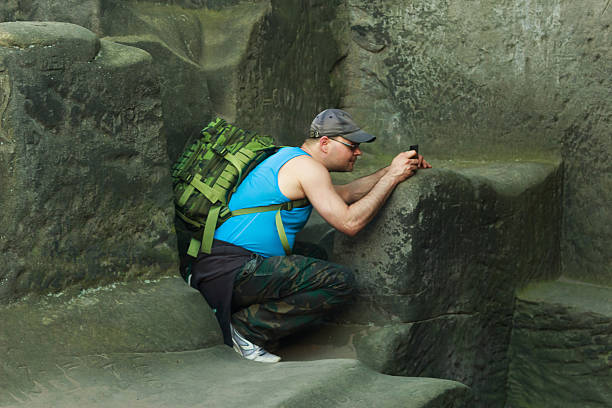 istock man photographing semisitting 622431402