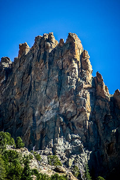 istock Jagged Peaks against a Bright Blue Sky - vertical 622432366