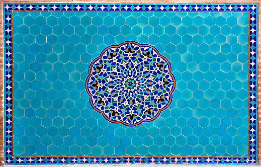 Beautiful blue tiled wall with patterns of Middle East in the historic home of Iran