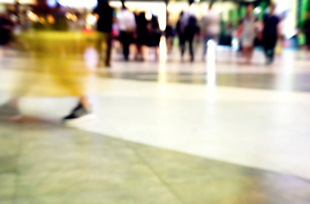 istock city people crowd abstract background blur action 622433246