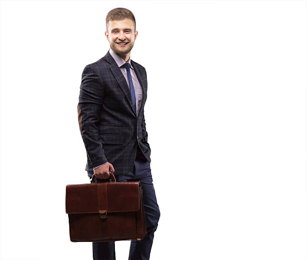 istock Young man smiling in a suit 622438184