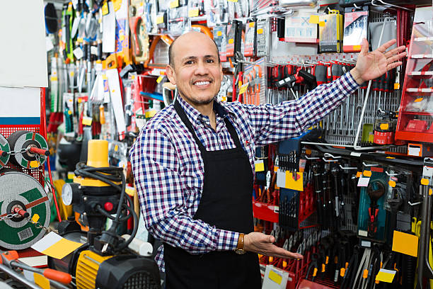 istock Seller posing near electric compressor 622439224