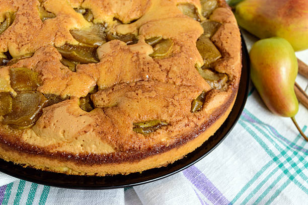 istock Home baked biscuit flavored pear charlotte cake with cinnamon 622439510