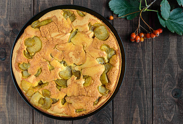 Home baked biscuit flavored pear charlotte cake with cinnamon.