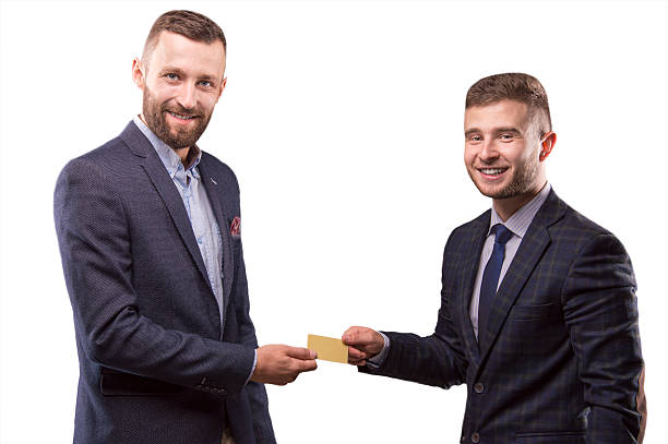 dos hombres con la tarjeta en manos de - invitation blank smiling business card fotografías e imágenes de stock