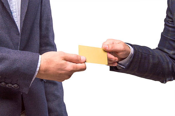 dos hombres con la tarjeta en manos de - invitation blank smiling business card fotografías e imágenes de stock