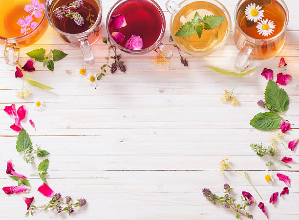 istock herbal tea on a white wooden background 622442670