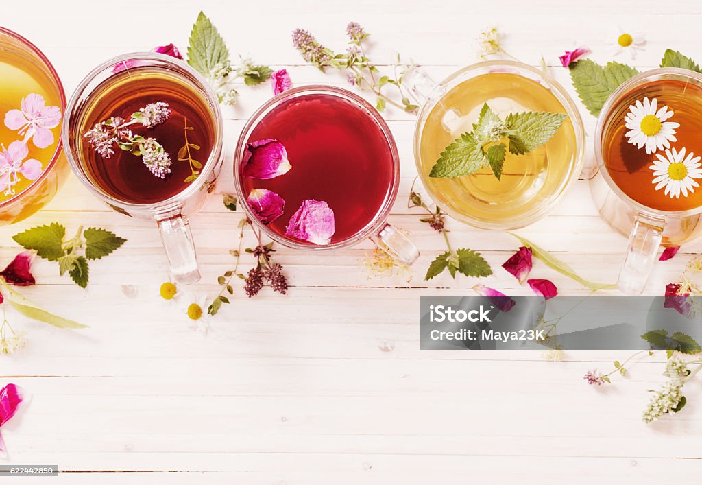 herbal tea on a white wooden background Tea - Hot Drink Stock Photo