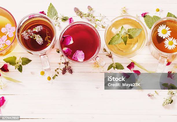 Herbal Tea On A White Wooden Background Stock Photo - Download Image Now - Tea - Hot Drink, Flower, Aromatherapy