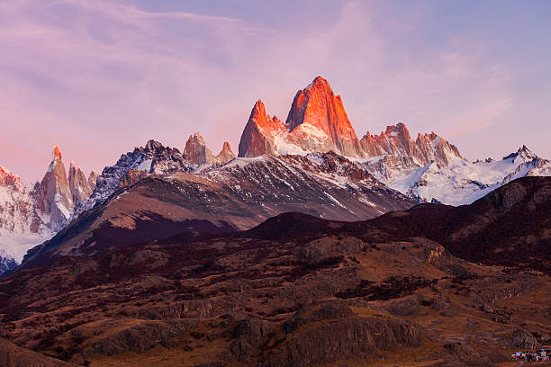 Monte Fitz Roy (also known as Cerro Chalten) aerial sunrise view. Fitz Roy is a mountain located near El Chalten, in the Southern Patagonia, on the border between Argentina and Chile.