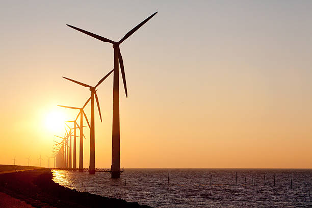 istock Wind turbines in the water 622448214