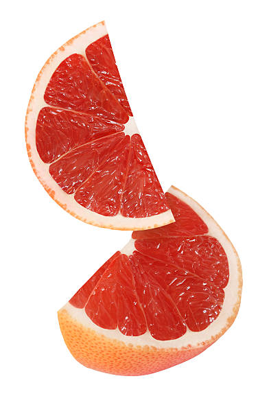 istock hanging, falling, flying grapefruit fruits isolated with clipping path 622450270