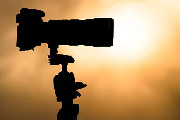 istock Low Angle View Of Silhouette Tripod And Camera 622452596