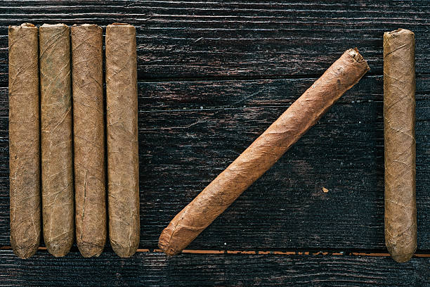 istock Group of cigars on the wood 622454292