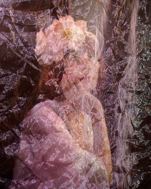 istock Senior Female  Behind A Silk Curtain 622455022