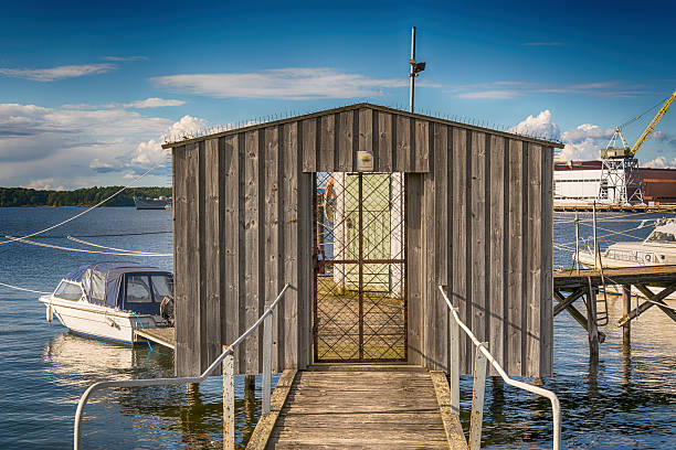 door on the dock - rowboat nautical vessel small motorboat imagens e fotografias de stock