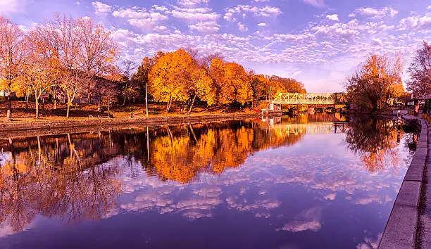 Photo of Brilliant Vibrant Late Autumn Erie Canal Foliage Colors and Reflections