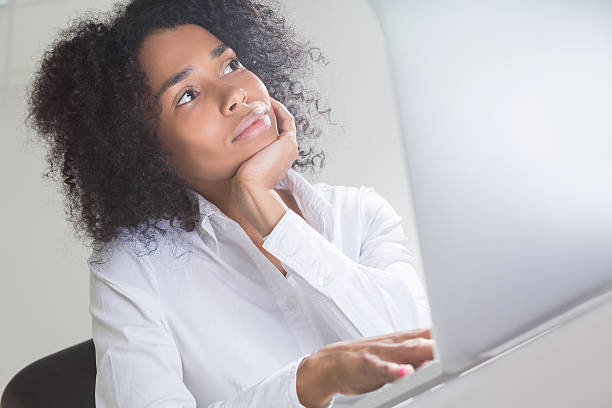 istock Slightly bored office employee from Africa 622456490