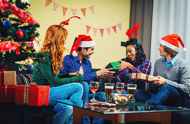 Christmas party with two couples at home