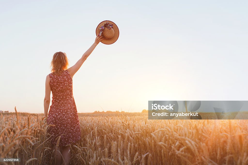 goodbye or parting concept, farewell background goodbye or parting background, farewell, woman waving hand in the field Leaving Stock Photo