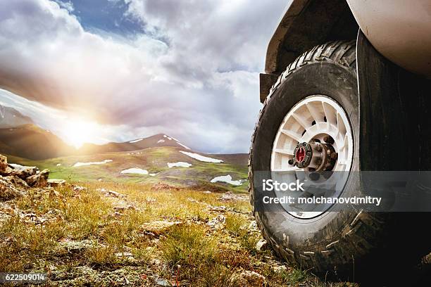 Big Car Wheel Offroad Concept Stock Photo - Download Image Now - Off-Road Vehicle, Dirt Road, Sports Utility Vehicle