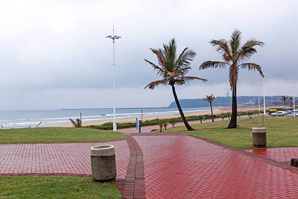 istock Wet Brick Paved Pathways Leading to Beach 622514780