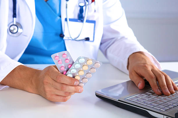 istock young doctor in the Office makes an entry 622515574