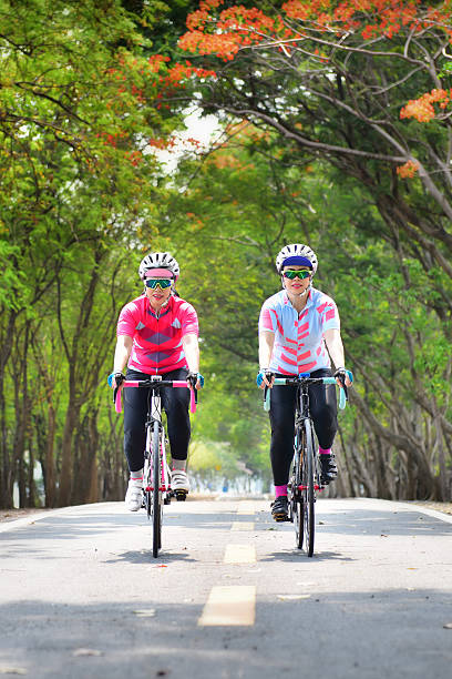 istock Two sportswoman ride bike 622520066