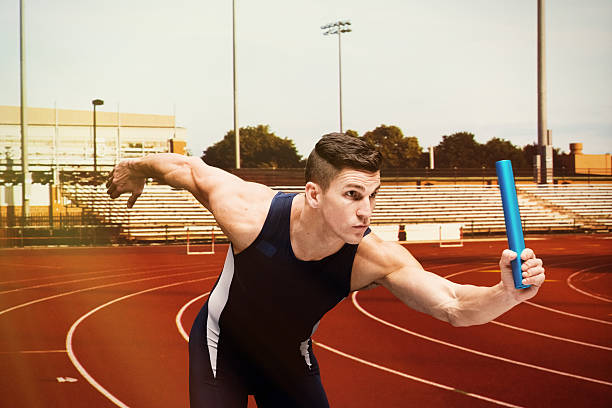 istock Male runner running at track and field 622521222