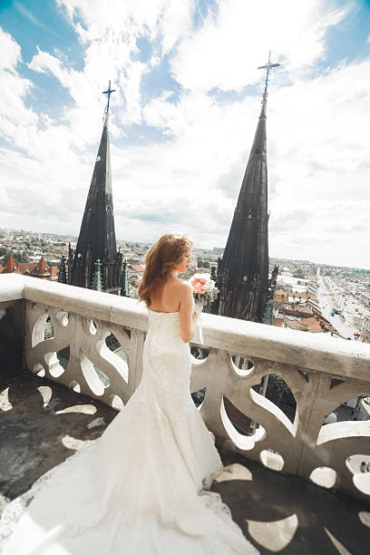 istock Beautiful luxury bride on the balcony with perfect landscape 622521398