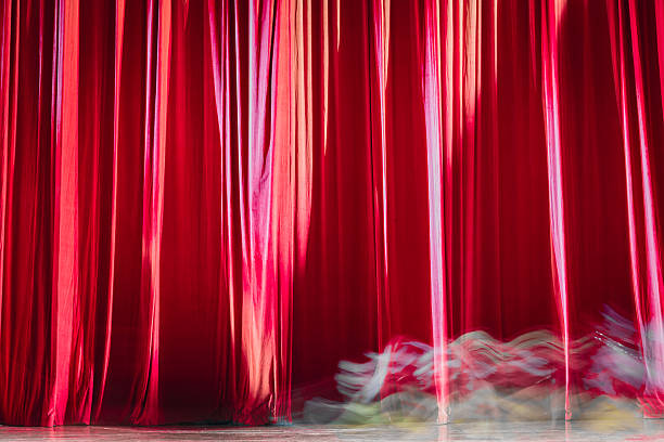 istock Red velvet curtains and motion. 622522528