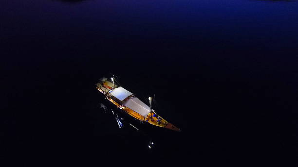 istock Sailing and live-aboard diving boat at night 622528252