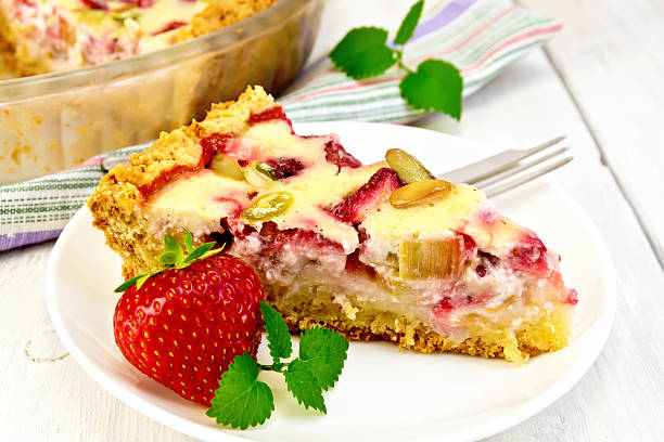 istock Pie strawberry-rhubarb with sour cream in white plate 622532458