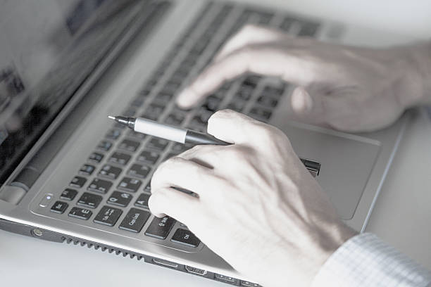 istock Working at home with laptop man 622534212