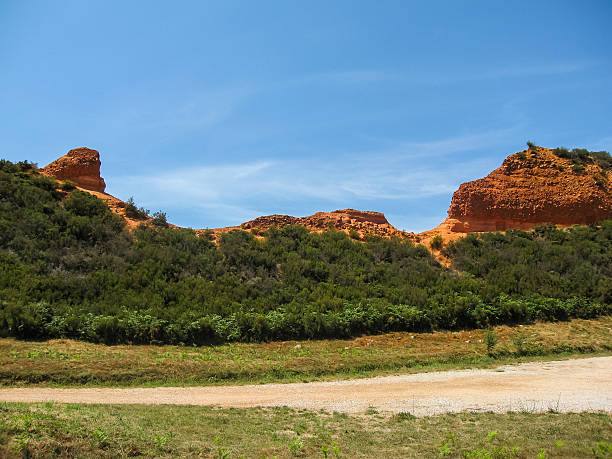 Beautiful and unique red rock formations at Las Medulas, Spain Landscape with beutiful and unique red rock formations at Las Madulas in Spain beautiful landscape in las medulas leon spain stock pictures, royalty-free photos & images