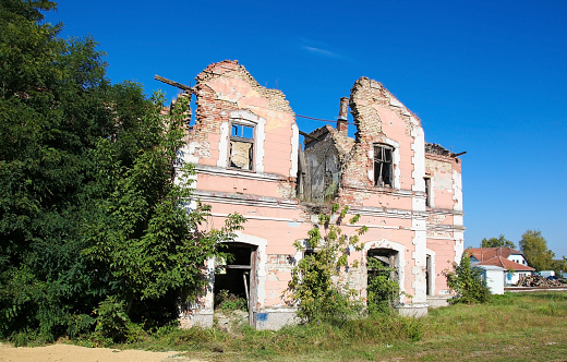 Abandoned house riddled with bullet holes during the Siege of Vukovar, on the shore of the River Danube in Slavonia, Croatia.