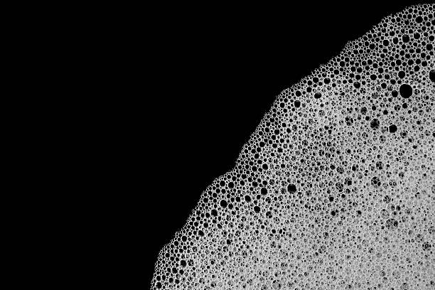 istock Close up soap foam bubble on black background 622540502