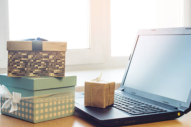 istock gift box and laptop, the concept of e-shopping 622542246