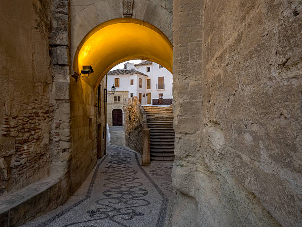 Street under the Church of the Incarnation in Alhama de Granada, Andalucia, Spain.