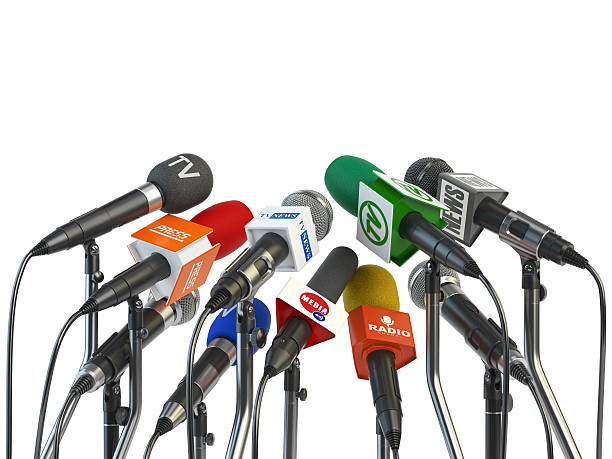 istock Microphones prepared for press conference or interview isolated 622545422