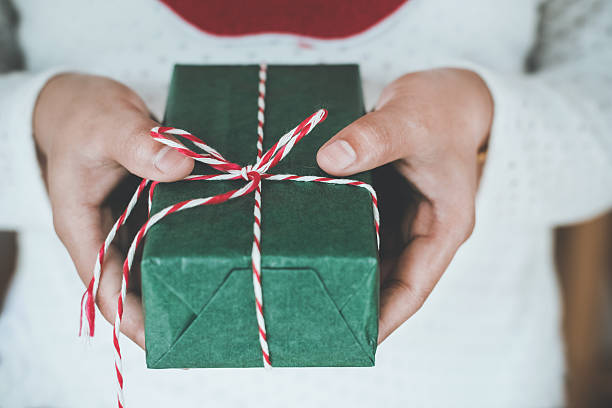 istock woman and gift box 622547154