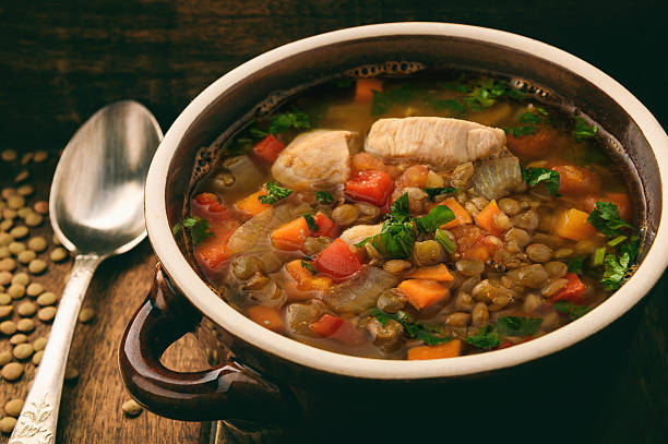 istock Hot soup with green lentil, chicken, vegetables and spices. 622547848