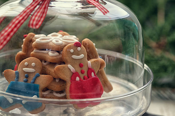 istock Christmas Gingerbread cookie  on glass stand with snow flakes 622548690